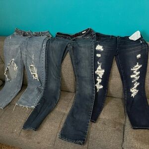 Bunch of jeans 27 and 26 and 28